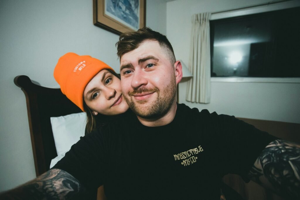 a man and a woman posing for a picture
